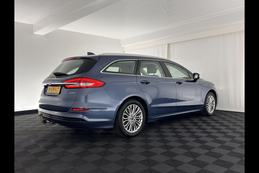 Ford Mondeo Wagon 2.0 IVCT HEV Titanium Luxury-Pack (INCL-BTW) Aut. *FULL-LEATHER | ADAPTIVE-CRUISE | FULL-LED | SONY-AUDIO | BLIND-SPOT | MEMORY-PACK | CAMERA | COMFORT-SEATS | NAVI-FULLMAP | ECC | PDC | TOWBAR | 17''ALU *