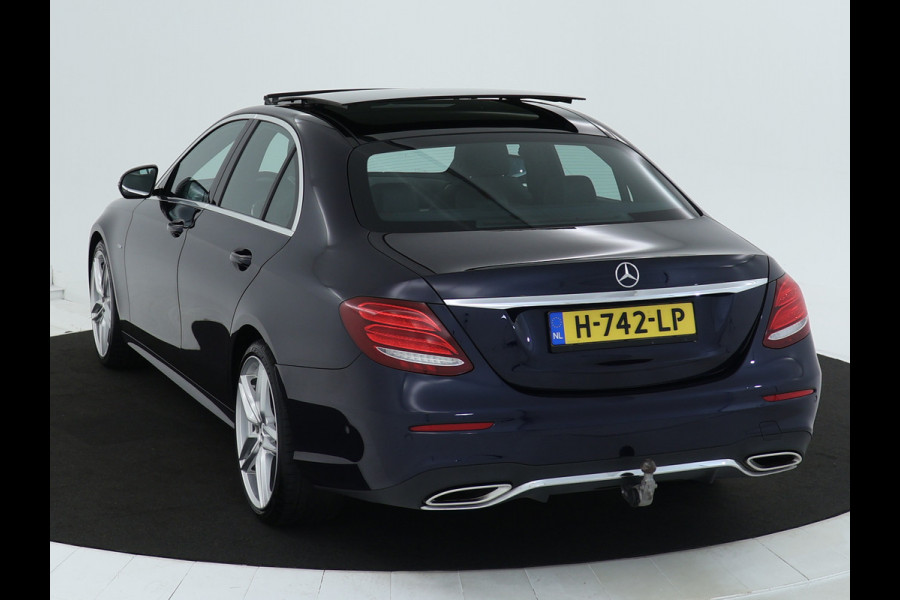 Mercedes-Benz E-Klasse 200 Business Solution AMG | Panoramadak | 5 spaaks AMG velgen | Wide screen | Parking support | Navigatie | Inclusief 24 maanden MB Certified garantie voor Europa.