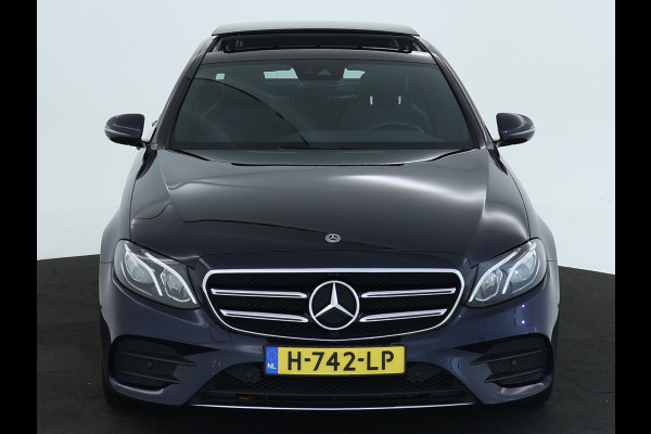 Mercedes-Benz E-Klasse 200 Business Solution AMG | Panoramadak | 5 spaaks AMG velgen | Wide screen | Parking support | Navigatie | Inclusief 24 maanden MB Certified garantie voor Europa.