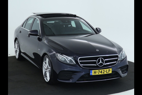 Mercedes-Benz E-Klasse 200 Business Solution AMG | Panoramadak | 5 spaaks AMG velgen | Wide screen | Parking support | Navigatie | Inclusief 24 maanden MB Certified garantie voor Europa.