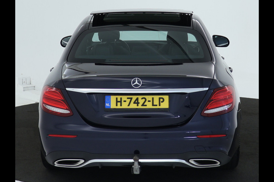 Mercedes-Benz E-Klasse 200 Business Solution AMG | Panoramadak | 5 spaaks AMG velgen | Wide screen | Parking support | Navigatie | Inclusief 24 maanden MB Certified garantie voor Europa.