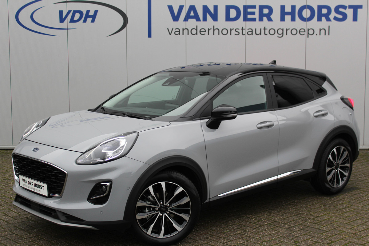 Ford Puma 1.0-125pk EcoBoost Mild-Hybrid Titanium X. Garantie t/m 22-04-2028 ! Slechts 5.800km ! Adaptive cruise cntrl, climate control, stoel-, stuur- en voorraamverw., navigatie, telefoonvoorb., camera, elektr. achterklep, B&O soundsyst., lane- en side assist, LED verlichting etc.