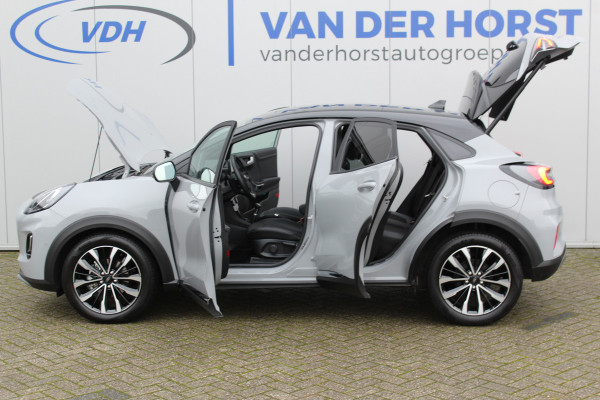 Ford Puma 1.0-125pk EcoBoost Mild-Hybrid Titanium X. Garantie t/m 22-04-2028 ! Slechts 5.800km ! Adaptive cruise cntrl, climate control, stoel-, stuur- en voorraamverw., navigatie, telefoonvoorb., camera, elektr. achterklep, B&O soundsyst., lane- en side assist, LED verlichting etc.