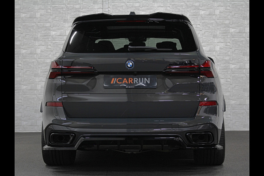 BMW X5 xDrive50e M-Performance Seats | M-Sport Pro | 360 View | Panorama | B&W High-End | Massage | Stoelventilatie | Head-Up | Dravit Grey | Carbon | Memory | Stoelverwarming V+A | 4-Zone Cima | Keyless-Entry | 22'' | Leder Indiv. | Trekhaak | Iconic Glow | Zonwering | Luchtvering | Draadloos Laden | Carplay |