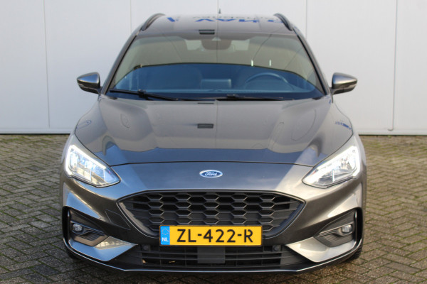 Ford FOCUS Wagon 1.0-125pk EcoBoost ST-Line AUTOMAAT ! Heel erg nette en goed onderhouden Ford Focus ST-Line wagon automaat. Volautm. airco dual, stoel-, stuur- en voorraamverw., camera, trekhaak, navigatie, telefoonvoorb., LM wln, cruise cntrl, skiluik etc., etc....