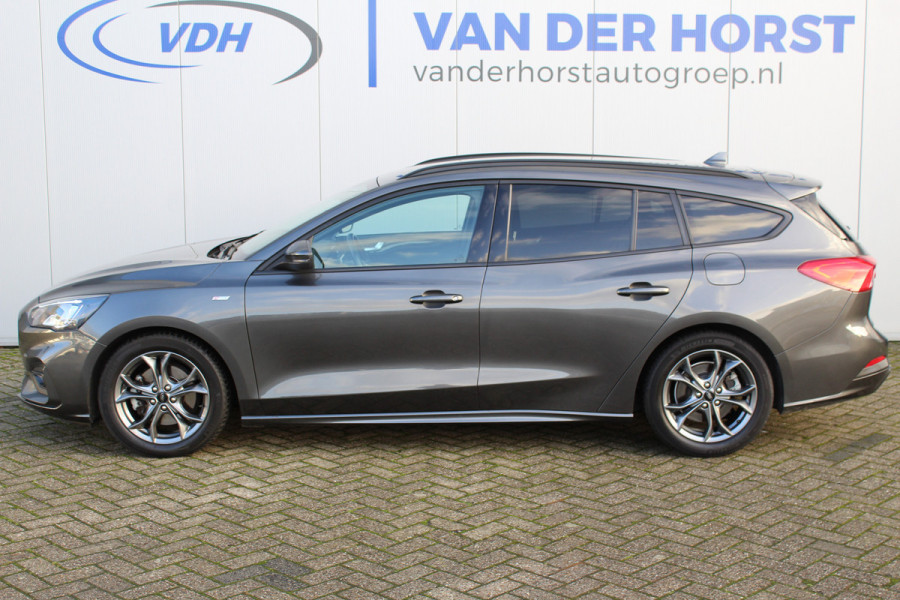 Ford FOCUS Wagon 1.0-125pk EcoBoost ST-Line AUTOMAAT ! Heel erg nette en goed onderhouden Ford Focus ST-Line wagon automaat. Volautm. airco dual, stoel-, stuur- en voorraamverw., camera, trekhaak, navigatie, telefoonvoorb., LM wln, cruise cntrl, skiluik etc., etc....