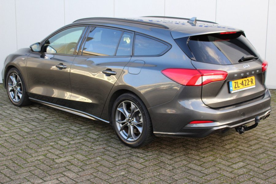 Ford FOCUS Wagon 1.0-125pk EcoBoost ST-Line AUTOMAAT ! Heel erg nette en goed onderhouden Ford Focus ST-Line wagon automaat. Volautm. airco dual, stoel-, stuur- en voorraamverw., camera, trekhaak, navigatie, telefoonvoorb., LM wln, cruise cntrl, skiluik etc., etc....