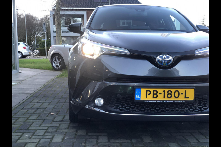 Toyota C-HR 1.8 Hybrid Executive | Navigatie, Half Leer, Parkeersensoren, Stoelverwarming, Keyless, 18 inch, Perfecte staat!