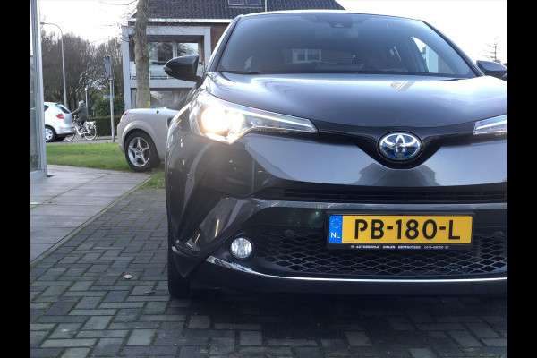 Toyota C-HR 1.8 Hybrid Executive | Navigatie, Half Leer, Parkeersensoren, Stoelverwarming, Keyless, 18 inch, Perfecte staat!