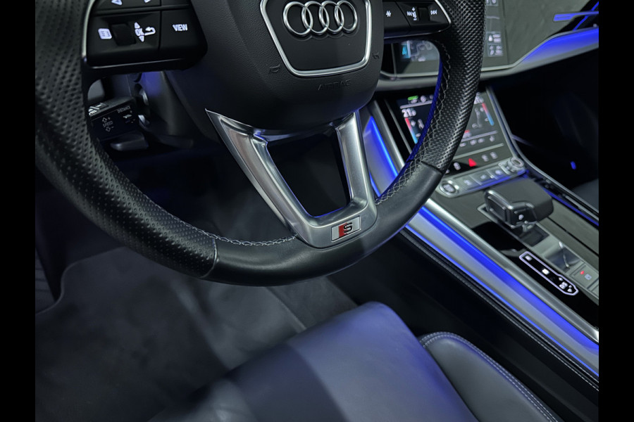 Audi Q7 55 TFSI e S-Line | RS-Seats | 360 View | Panorama | ACC | B&O Sound | Laser-LED | Head-Up | Keyless-Entry | Memory | Trekhaak | ISO-Glas | Luchtvering | 22'' | Dodehoek | Leder Pakket | Zonwering | Sfeerverlichting | Stuurverwarming | Stoelverwarming | Carplay | DAB |