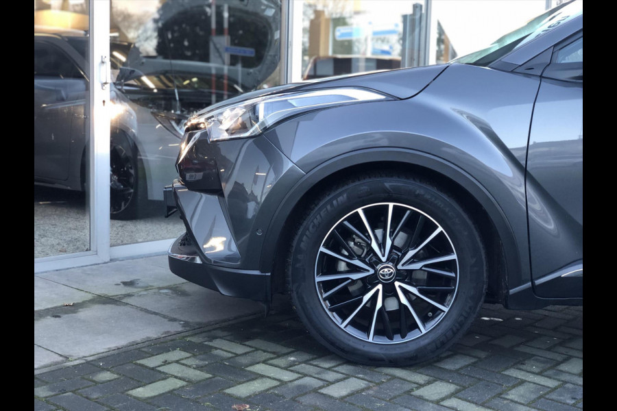 Toyota C-HR 1.8 Hybrid Executive | Navigatie, Half Leer, Parkeersensoren, Stoelverwarming, Keyless, 18 inch, Perfecte staat!