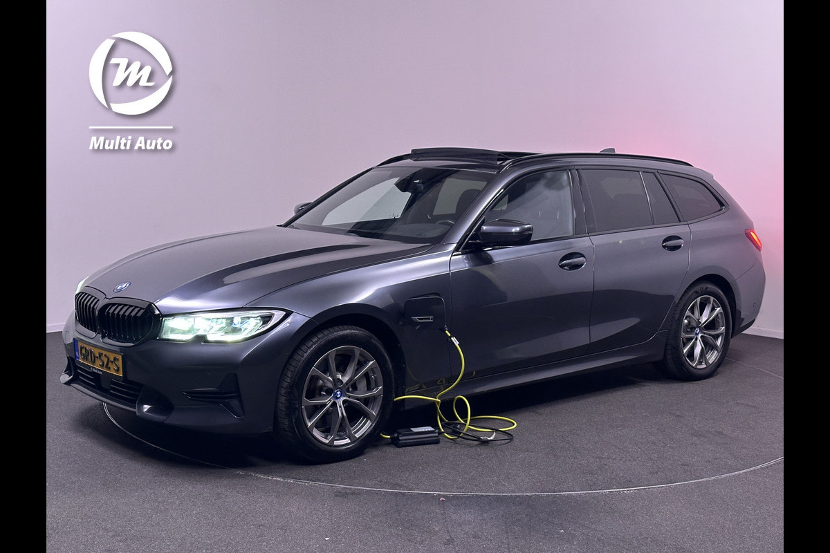 BMW 3 Serie Touring 330e Sportline Plug in Hybrid PHEV | Trekhaak af Fabriek | Panodak | Laser Led | Adaptive Cruise | Head-up Display | Carplay | Sportstoelen Verwarmd |