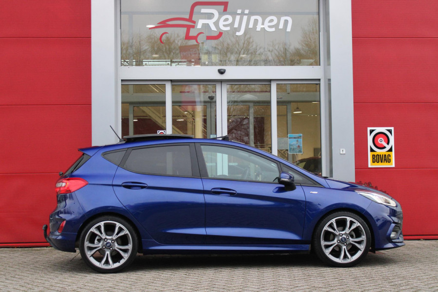 Ford Fiesta 1.0 100PK ST-LINE | PANORAMISCH SCHUIF/KANTEL DAK | TREKHAAK | CLIMATE CONTROL | VOORRUIT VERWARMING | LICHTMETALEN VELGEN 18" | LIGHT UPGRADE PACK | CRUISE CONTROL | DAB+ RADIO | LANE ASSIST | NAVIGATIE |