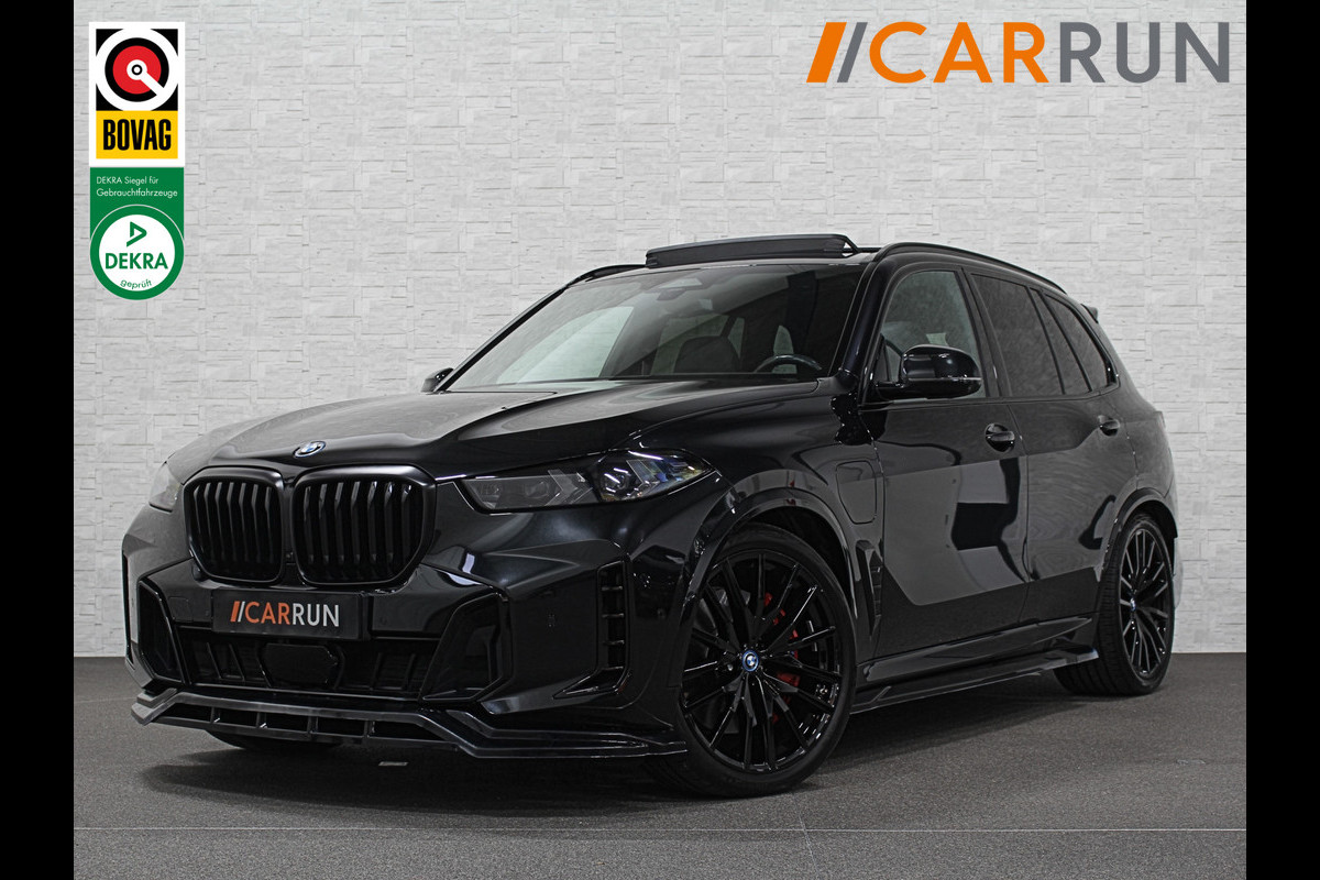 BMW X5 50e M-Performance Seats | M-Sport Pro | 360 View | Panorama | Individual Leder | Soft-Close | Stoelventilatie | Stoelverwarming V+A | Memory | Keyless-Entry | Trekhaak | 22'' | Iconic Glow | Luchtvering | Beker Koeling + Verwarming | Zonwering | Carplay | Draadloos Laden |