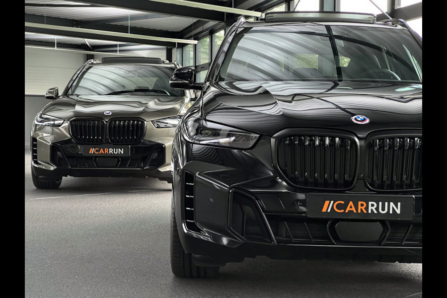 BMW X5 xDrive50e M-Performance Seats | M-Sport Pro | 360 View | ACC | Panorama | Soft-Close | Carbon | Ambiente Geur & verlichting | Head-Up | Stoelventilatie | Memory | Drive-Recorder | Harman-Kardon | 22'' | Laser-LED | Zonwering | Iconic-Glow | 4-Zone Clima | Trekhaak | Keyless-Entry | Leder-Pakket | ISO-Glas | Luchtvering | Draadloos laden | Carplay |