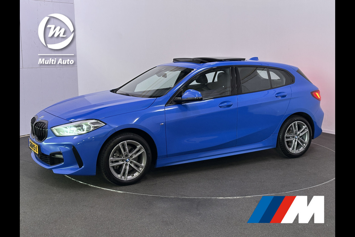 BMW 1-serie 118i M Sport Dealer O.H Misanoblauw | Panodak | Keyless | Trekhaak Afn | Camera | Apple Carplay | Sfeerverlichting | Sportstoelen Verwarmd | Navi Pro |