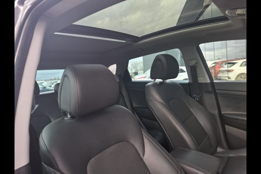 Hyundai Tucson 1.6 T-GDI Premium Automaat | Panodak | Lederen Sportstoelen | Trekhaak Afneembaar | Apple Carplay | Navigatie | Cruise Control | Navigatie | Camera | L.M. 19" |