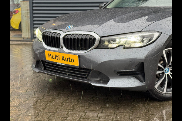 BMW 3 Serie Touring 330e Sportline Plug In Hybrid PHEV | Panorama dak | Head Up Display | Carplay | Sportstoelen verwarmd