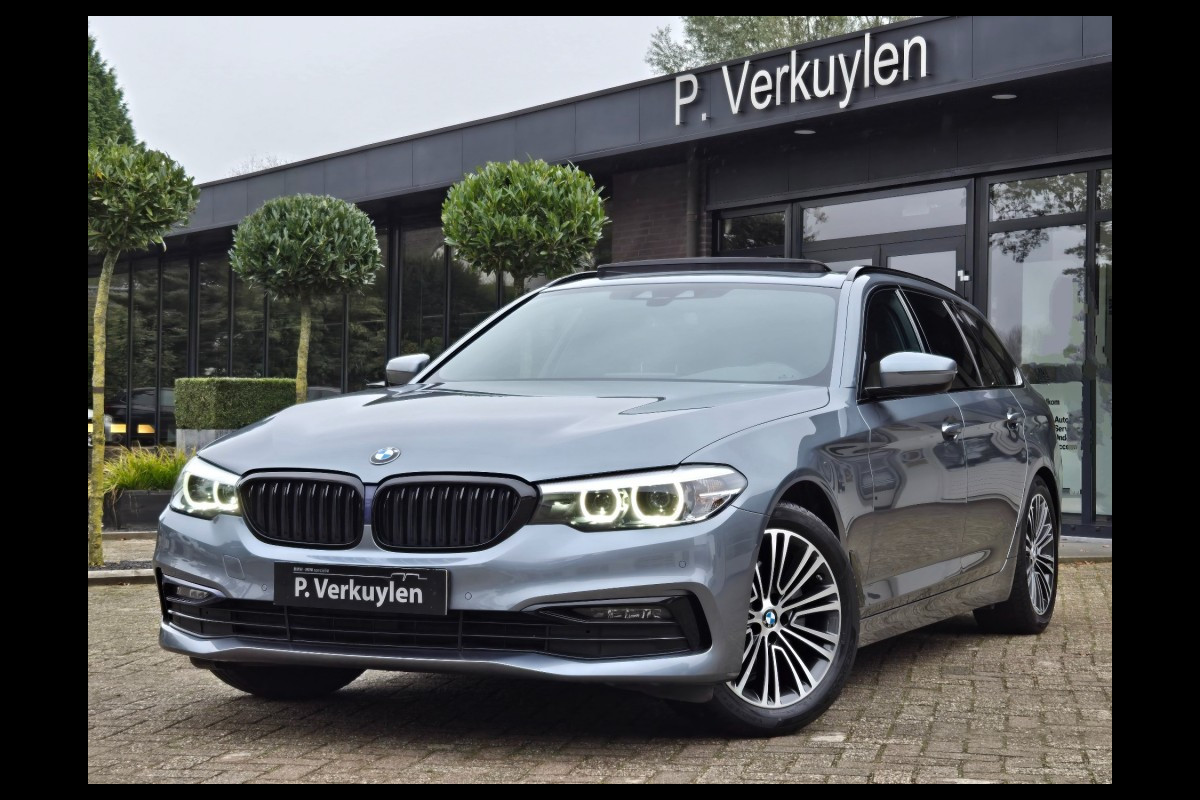 BMW 5 Serie 520i SPORTLINE I PANORAMA I SPORTSTOELEN I CAMERA I TREKHAAK I