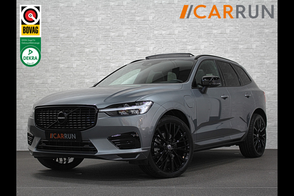 Volvo XC60 2.0 T8 AWD R-Design | Luchtvering | Panorama | ACC | Harman-Kardon | Pilot-Assist | Leder | Memory | Keyless-Entry | Voorruit/Stuur/Stoel-Verwarming | Sportstoelen | Leder | Zwarte Hemel | Camera | Getint Glas | Carplay | DAB | Draadloos Laden |