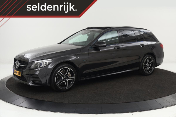 Mercedes-Benz C-Klasse 300e AMG | Dealer onderhouden | Panoramadak | Stoelverwarming | Carplay | Matrix LED | Sfeerverlichting | 360 camera | Navigatie