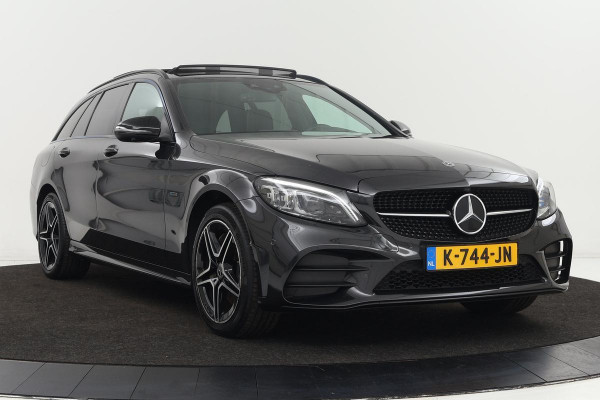 Mercedes-Benz C-Klasse 300e AMG | Dealer onderhouden | Panoramadak | Stoelverwarming | Carplay | Matrix LED | Sfeerverlichting | 360 camera | Navigatie