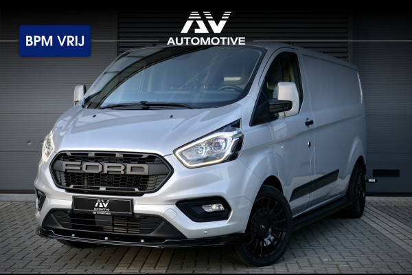 Ford Transit Custom 300 2.0 TDCI 170 PK L2H1 Raptor Edition | BPM VRIJ | Camera | Bi-Xenon | ACC | CarPlay | Navigatie | Stoelverwarming | Trekhaak | 3-Zitter | Nieuwe APK | Onderhoudsbeurt