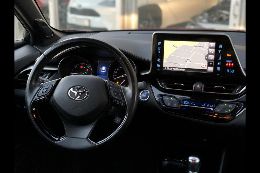 Toyota C-HR 1.8 Hybrid Style Bi-Tone | Leer, JBL, Trekhaak, Navigatie, Dodehoekherkenning, Stoelverwarming, Parkeersensoren