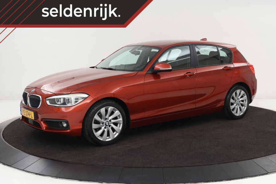 BMW 1-serie 118i High Executive | Adaptive cruise | Leder | Trekhaak | Stoelverwarming | Full LED | Navigatie | PDC | Climate control