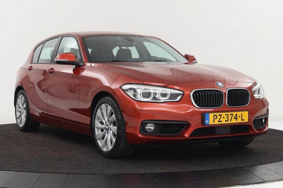 BMW 1-serie 118i High Executive | Adaptive cruise | Leder | Trekhaak | Stoelverwarming | Full LED | Navigatie | PDC | Climate control