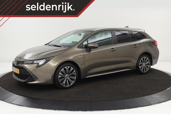 Toyota Corolla 2.0 Hybrid Business Plus | Stoelverwarming | Carplay | Camera | Full LED | Adaptive cruise | Keyless | Navigatie | DAB | Climate control