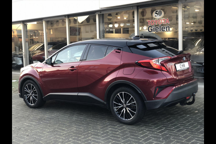 Toyota C-HR 1.8 Hybrid Style Bi-Tone | Leer, JBL, Trekhaak, Navigatie, Dodehoekherkenning, Stoelverwarming, Parkeersensoren