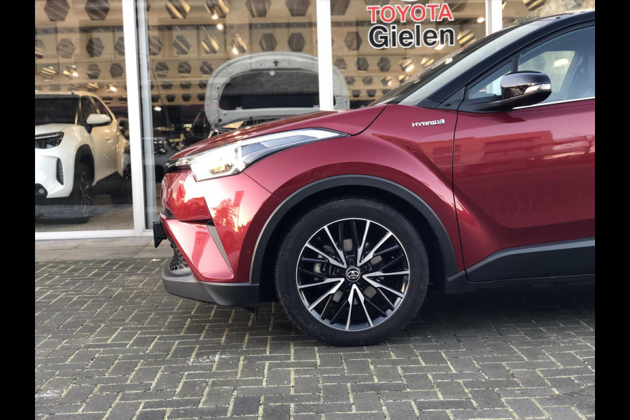 Toyota C-HR 1.8 Hybrid Style Bi-Tone | Leer, JBL, Trekhaak, Navigatie, Dodehoekherkenning, Stoelverwarming, Parkeersensoren