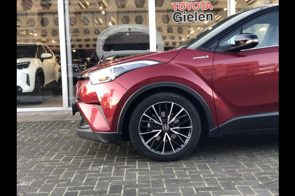 Toyota C-HR 1.8 Hybrid Style Bi-Tone | Leer, JBL, Trekhaak, Navigatie, Dodehoekherkenning, Stoelverwarming, Parkeersensoren