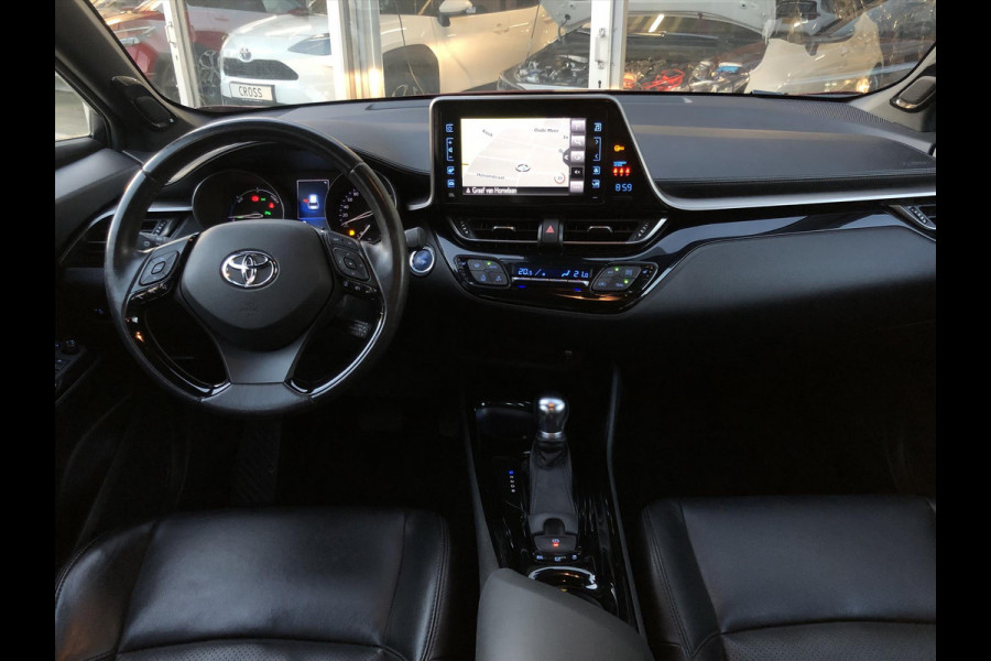 Toyota C-HR 1.8 Hybrid Style Bi-Tone | Leer, JBL, Trekhaak, Navigatie, Dodehoekherkenning, Stoelverwarming, Parkeersensoren