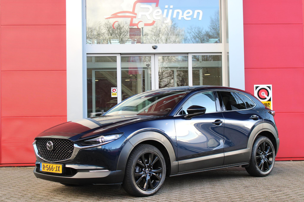 Mazda CX-30 2.0 e-SkyActiv-X M Hybrid 187PK HOMURA | APPLE CARPLAY/ANDROID AUTO | FULL LED KOPLAMPEN | DAB+ RADIO | CLIMATE CONTROL | STOEL VERWARMING | ADAPTIVE CRUISE CONTROL | LICHTMETALEN VELGEN BLACK | ALL SEASON BANDEN | DODEHOEK DETECTIE | ELEKTRISCHE ACHTERKLEP | STOEL VERWARMING |