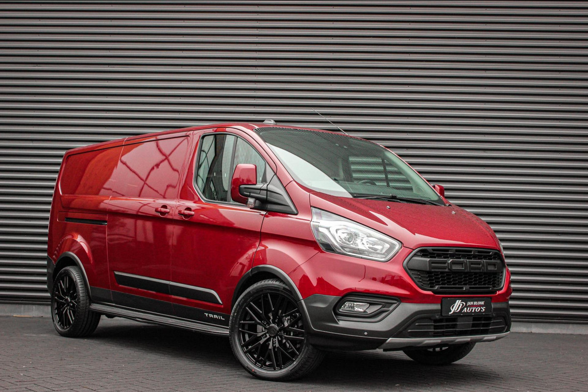 Ford Transit Custom 2.0 TDCI L2H1 TRAIL 170PK 6-BAK / NAVIGATIE / TREKHAAK / LEDEREN BEKLEDING / SPOILER / CAMERA / PDC / BPM VRIJ