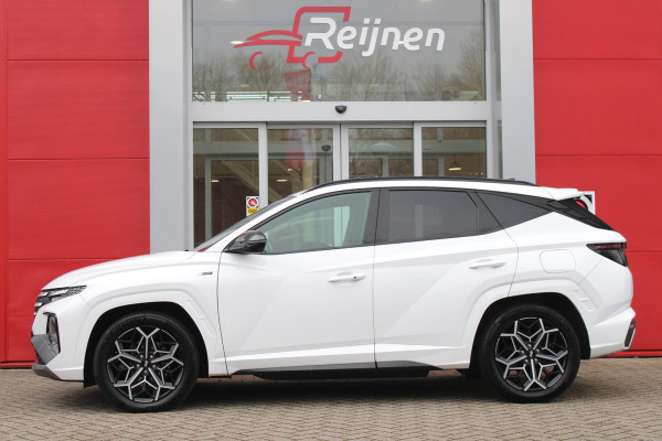 Hyundai Tucson 1.6 T-GDI 266PK PHEV N LINE 4WD | NAVIGATIE | APPLE CARPLAY/ANDROID AUTO | ADAPTIVE CRUISE CONTROL | DODEHOEK DETECTIE | VOOR/ACHTERBANK VERWARMD | CLIMATE CONTROL | FULL LED KOPLAMPEN | ACHTERUITRIJ CAMERA | ELEKTRISCH BEDIENBARE ACHTERKLEP | STUUR VERWARMING | KEYLESS ENTRY/START | 19" LICHTMETALEN VELGEN | DODEHOEK DETECTIE |