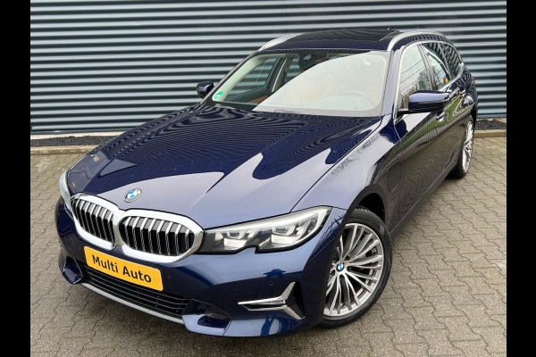 BMW 3 Serie Touring 330e Luxury Line Plug-in Hybrid PHEV | Trekhaak af Fabriek | Panodak | Adaptive Onderstel | Carplay | Sfeerverlichting |