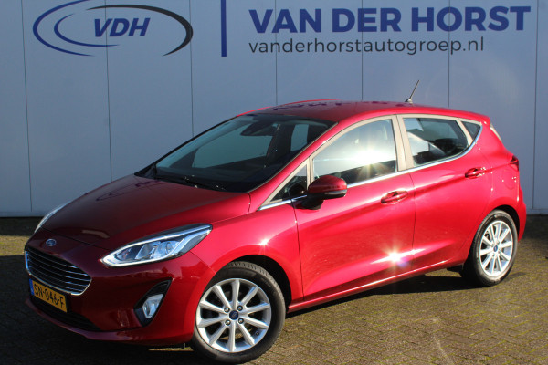 Ford Fiesta 1.0-100pk EcoBoost Titanium. Mooie chique verschijning ! Volautm. airco, telefoonvoorb., cruise control, parkeersensoren, LM wielen, trekhaak, B&O soundsyst., navigatie, etc.