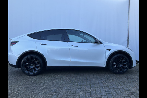 Tesla Model Y Long Range AWD 75 kWh 514pk Autopilot Stuur/Stoelverw Pano Trekhaak (1600kg)