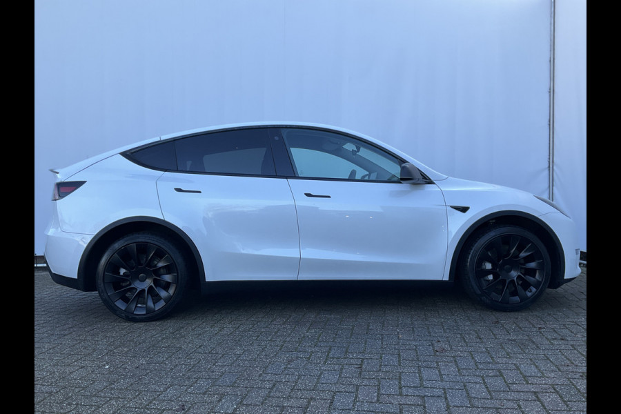 Tesla Model Y Long Range AWD 75 kWh 514pk Autopilot Stuur/Stoelverw Pano Trekhaak (1600kg)