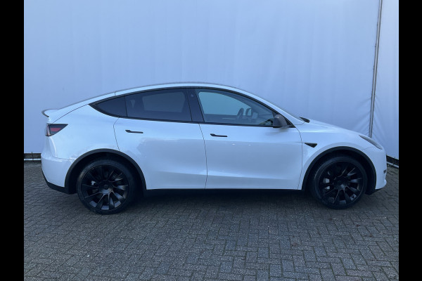 Tesla Model Y Long Range AWD 75 kWh 514pk Autopilot Stuur/Stoelverw Pano Trekhaak (1600kg)