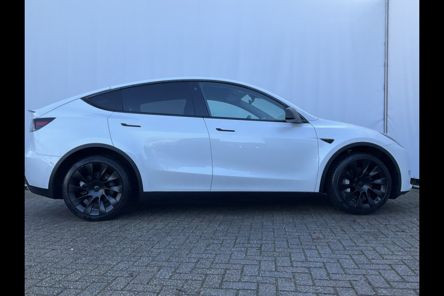 Tesla Model Y Long Range AWD 75 kWh 514pk Autopilot Stuur/Stoelverw Pano Trekhaak (1600kg)