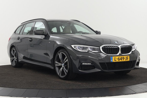 BMW 3-serie 320e M Sport | Laserlight | Trekhaak | Stoelverwarming | Harman/Kardon Sound | Carplay | Adaptief demping | Leder | Navigatie