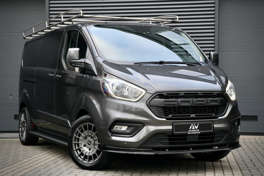 Ford Transit Custom 300 2.0 TDCI L2H1 | Raptor Edition | Navigatie | Camera | CarPlay | Lane Assist | Trekhaak | Airco | 3-Zitter | NAP Logisch | Dealer onderhouden | Nieuwe APK | Onderhoudsbeurt