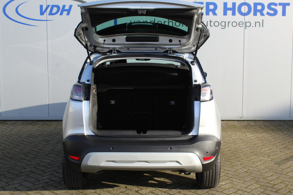 Opel Crossland 1.2-110pk Turbo 'Elegance'. Mooie en luxe hoogzitter met weinig km's ! Volautm. airco dual, cruise control, camera, comfortstoelen, metallic lak,  LM wielen, navigatie, telefoonvoorb., lane- en side assist, parkeersensoren v+a,  LED verlichting  etc.