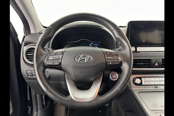 Hyundai Kona EV Comfort 64 kWh [ 3-Fase ] (INCL-BTW) *HEAT-PUMP | DIGI-COCKPIT | ADAPTIVE-CRUISE | KRELL-AUDIO | NAVI-FULLMAP | APP.CONNECT | DAB | LANE-ASSIST | KEYLESS | COMFORT-SEATS | CCS-FASTLOADER | SHIFT-PADDLES | 17"ALU*