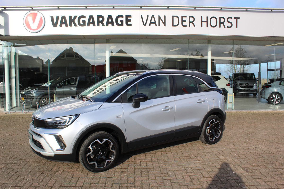 Opel Crossland 1.2-110pk Turbo 'Elegance'. Mooie en luxe hoogzitter met weinig km's ! Volautm. airco dual, cruise control, camera, comfortstoelen, metallic lak,  LM wielen, navigatie, telefoonvoorb., lane- en side assist, parkeersensoren v+a,  LED verlichting  etc.