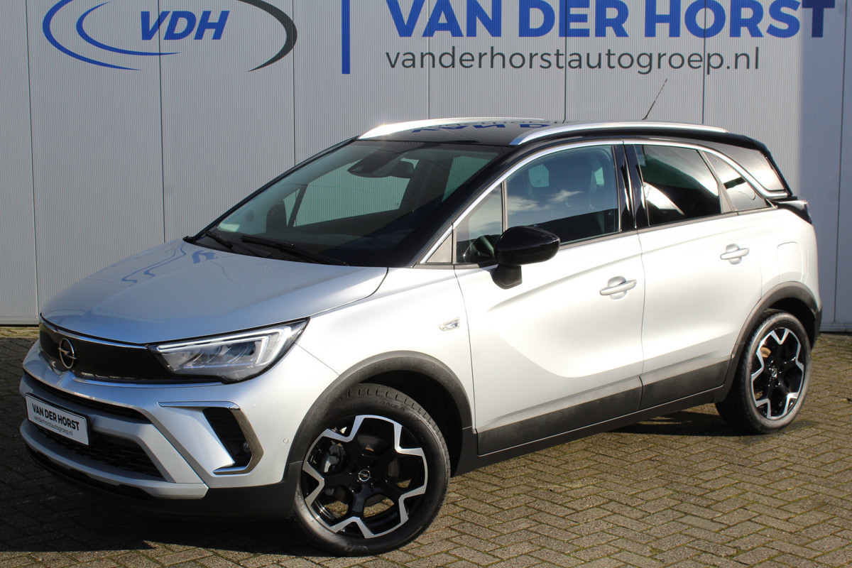 Opel Crossland 1.2-110pk Turbo 'Elegance'. Mooie en luxe hoogzitter met weinig km's ! Volautm. airco dual, cruise control, camera, comfortstoelen, metallic lak,  LM wielen, navigatie, telefoonvoorb., lane- en side assist, parkeersensoren v+a,  LED verlichting  etc.